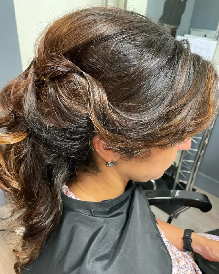 Deep, rich brunette hair with subtle mahogany lowlights and a healthy shine