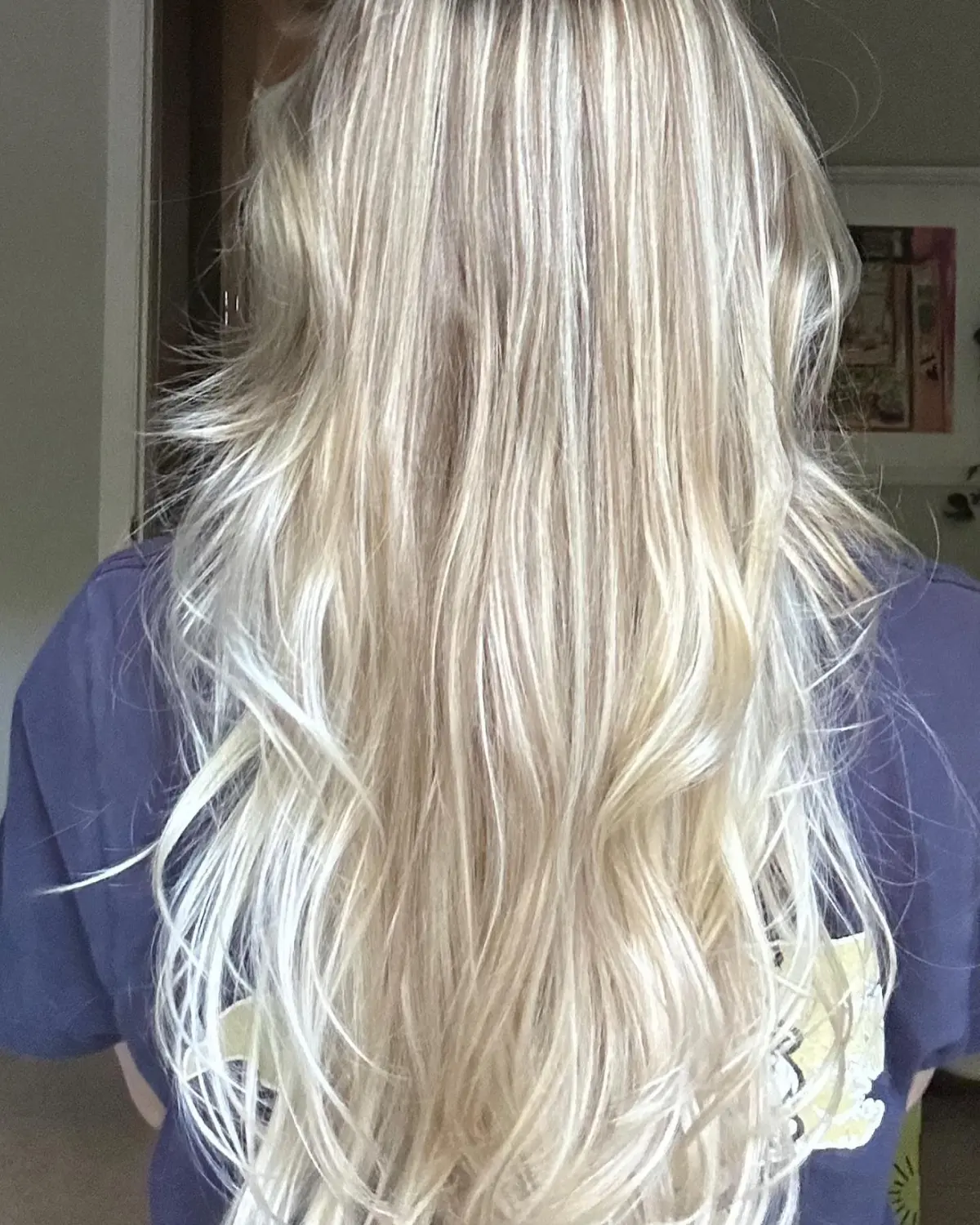 Full blonde hair with a seamless ombre balayage highlighting technique for added dimension