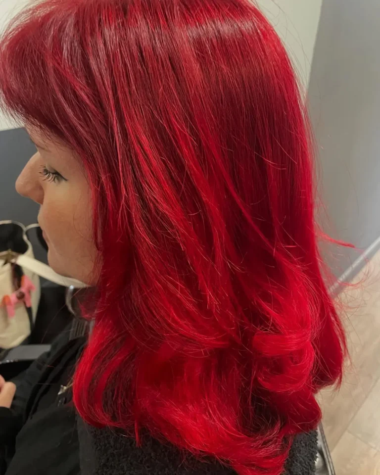 Bold red hair color with a soft dark root blend, done at Seoul Scissors in Brooklyn