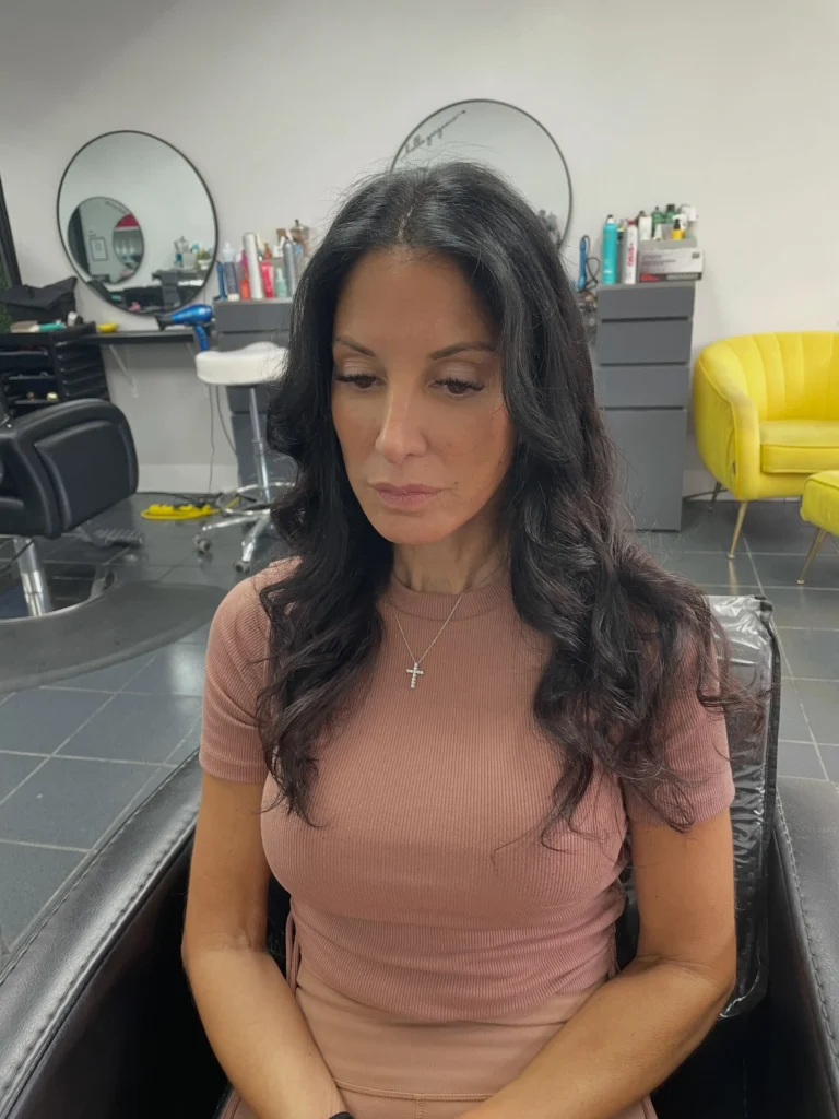 Korean-style blowout styling — smooth roots with soft, bouncy waves