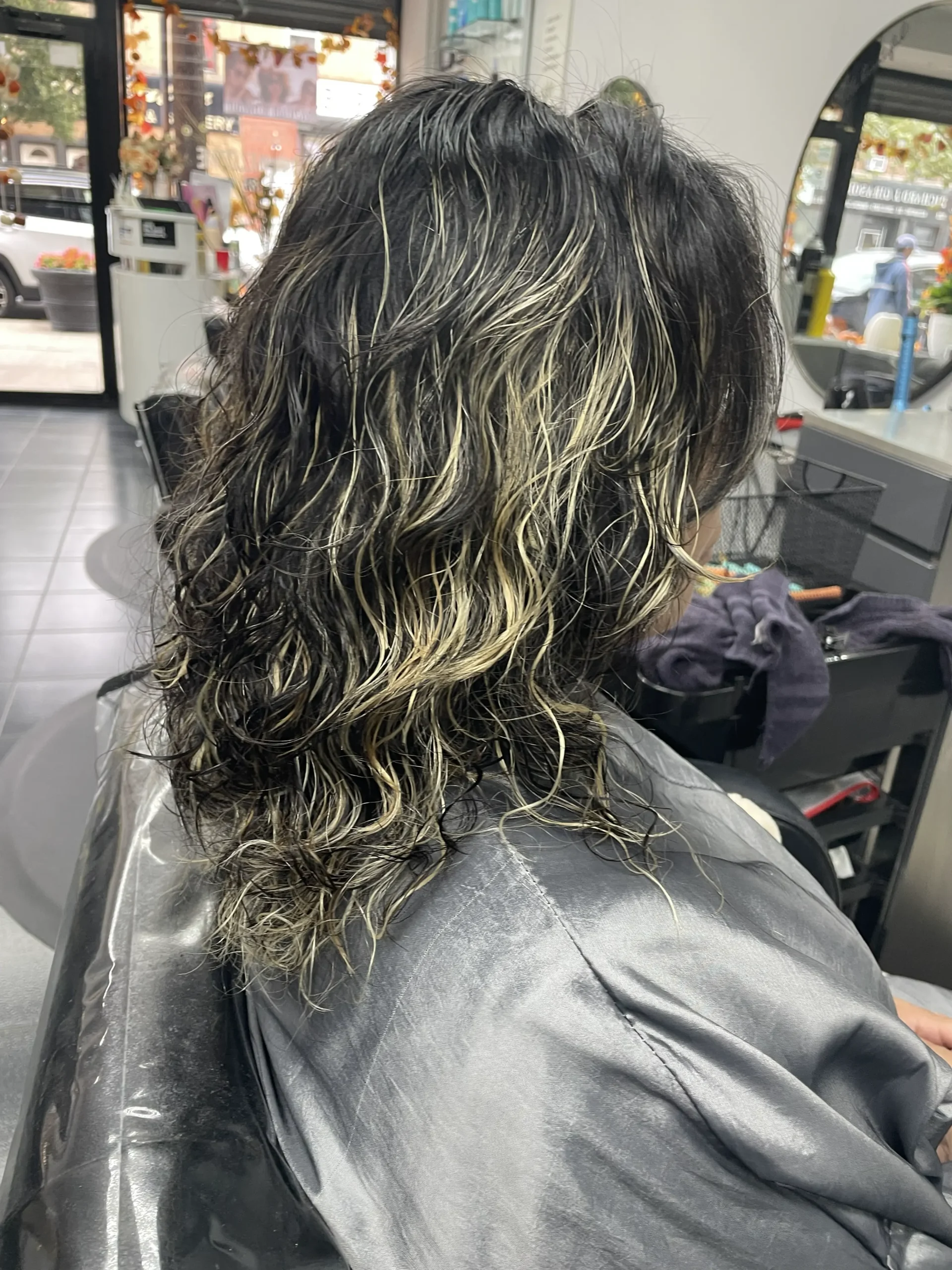 Korean wave perm with blonde highlights