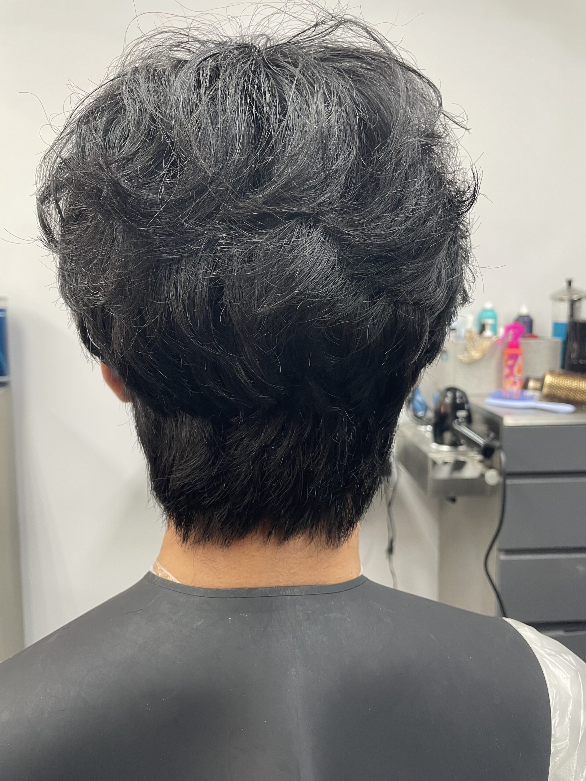 Men’s wolf cut with a mullet-length back, view from behind, Seoul Scissors Brooklyn